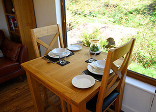 Chracaig Bheag Portree Self Catering contains a dining area with all crockery provided